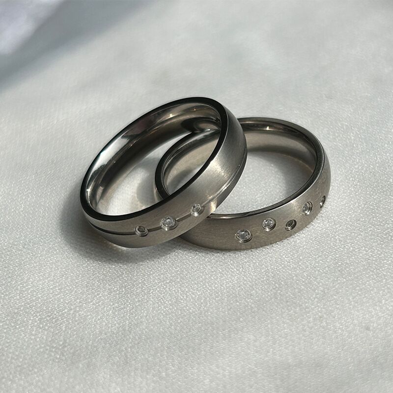 domed stone set titanium rings with thin grooves domed stone set titanium rings with thin grooves